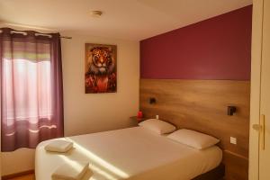 Postel nebo postele na pokoji v ubytování Fasthôtel Limoges Nord - FH Confort