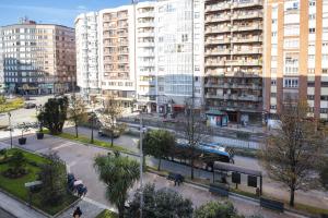 an aerial view of a city with tall buildings at Apartamento Vargas 2BDR in Santander