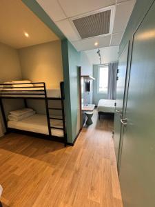 Posteľ alebo postele v izbe v ubytovaní ibis budget Nancy Laxou