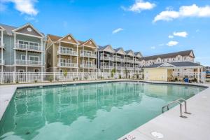 an image of a swimming pool at a resort at Sanibel Seas in Ocean City