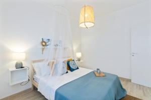 Posteľ alebo postele v izbe v ubytovaní Casa un Tocco di Blu con piscina privata