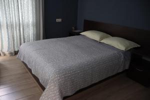 Postel nebo postele na pokoji v ubytování Family Hotel Avramov