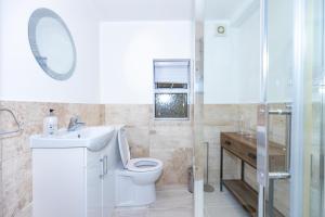 Koupelna v ubytování First Class Flat