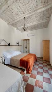 Postel nebo postele na pokoji v ubytování Selice 9 B&B