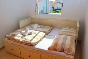 Postel nebo postele na pokoji v ubytování Haus Almassora playa Strandnähe + 14 fotografií