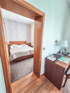 Ліжко або ліжка в номері Hotel Mario