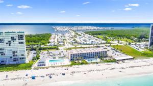 an aerial view of a beach and buildings at Bluewater Haven in Jensen Beach