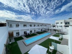 an aerial view of a hotel with a swimming pool at Island Home Fuerteventura in Corralejo