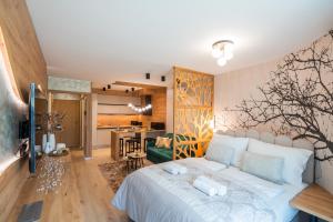 Μια τηλεόραση ή/και κέντρο ψυχαγωγίας στο MyFlat Wave Lilien Suite