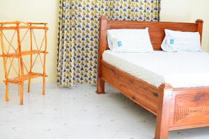 Postel nebo postele na pokoji v ubytování kikoti nungwi zanzibar