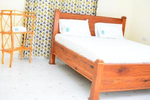 Postel nebo postele na pokoji v ubytování kikoti nungwi zanzibar + 17 fotografií