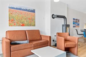 Ein Sitzbereich in der Unterkunft DünenResort Binz DünenResort Binz 135