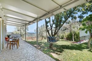 Φωτογραφία από το άλμπουμ του Cozy 2-bdrm-house With Garden στην Κατούνα
