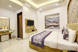 TV a/nebo společenská místnost v ubytování Hotel Armani By SMART GROUP
