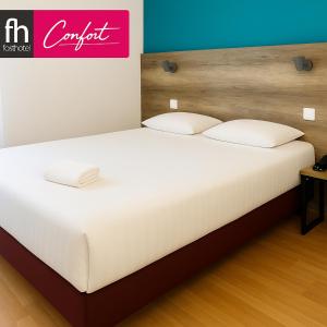 Postel nebo postele na pokoji v ubytování Fasthôtel Limoges Nord - FH Confort