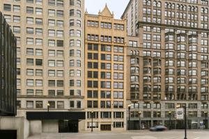 a large building with many windows in a city at Sonder by Marriott Bonvoy The Plymouth Apartments Loop in Chicago