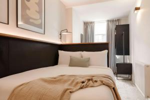 Voodi või voodid majutusasutuse The Earl Hotel Leeson Street, Sonder by Marriott Bonvoy toas