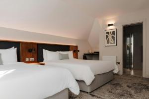 Voodi või voodid majutusasutuse The Earl Hotel Leeson Street, Sonder by Marriott Bonvoy toas