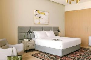 Postel nebo postele na pokoji v ubytování Sonder by Marriott Bonvoy JBR The Walk Apartments