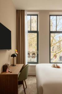 Postel nebo postele na pokoji v ubytování Middelland Hotel, Sonder by Marriott Bonvoy + 33 fotografií