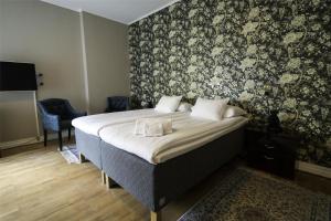 Letto o letti in una camera di Grand Hotel Jonkoping, BW Signature Collection