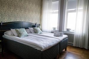 Letto o letti in una camera di Grand Hotel Jonkoping, BW Signature Collection