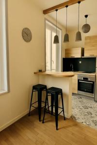 Kuchyň nebo kuchyňský kout v ubytování Charming studio for 2 Quartier Terreaux Croix-Rousse