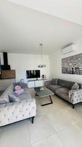 Posezení v ubytování Murter - Jezera Luxury Apartments