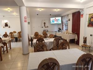 TV a/nebo společenská místnost v ubytování Valle Mistico Hotel Boutique