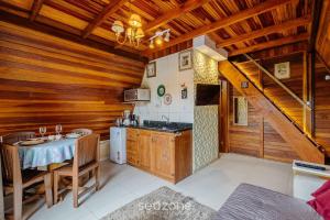 Kuchyň nebo kuchyňský kout v ubytování Studios completos perto da praia da Armação e do Parque Beto Carrero - TRS