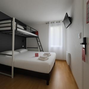Postel nebo postele na pokoji v ubytování Fasthôtel Limoges Nord - FH Confort + 37 fotografií