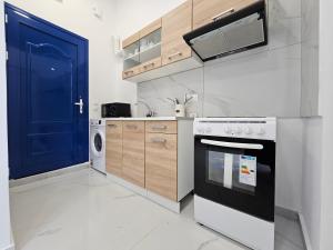 Η κουζίνα ή μικρή κουζίνα στο Agia Sofia Cycladic Suites