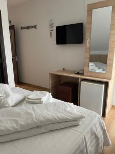 Postel nebo postele na pokoji v ubytování Casa Sunshine