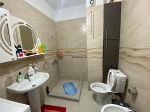 Ένα μπάνιο στο Apartment Norga