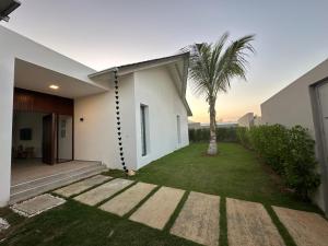 Aed väljaspool majutusasutust VILLA CORAL Tracadero Beach Resort