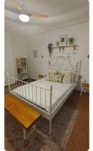 Ένα ή περισσότερα κρεβάτια σε δωμάτιο στο Habitaciones en casa particular