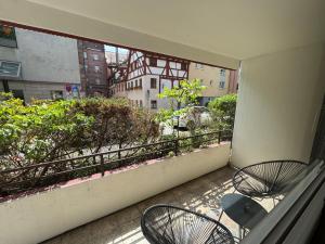 En balkon eller terrasse på Altstadtoase an der Marientormauer