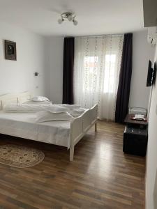 Postel nebo postele na pokoji v ubytování Casa Sunshine