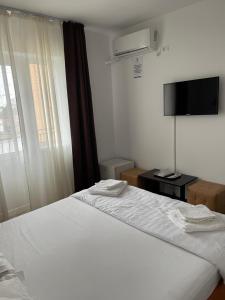 Postel nebo postele na pokoji v ubytování Casa Sunshine