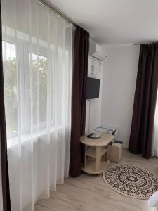 TV a/nebo společenská místnost v ubytování Casa Sunshine