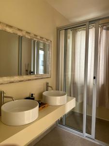 Vannituba majutusasutuses Vila Cristina Alojamento, Praia Estoril, Boa Vista