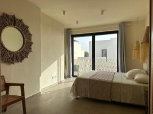 Voodi või voodid majutusasutuse Vila Cristina Alojamento, Praia Estoril, Boa Vista toas +16 fotot