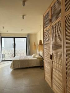 Voodi või voodid majutusasutuse Vila Cristina Alojamento, Praia Estoril, Boa Vista toas