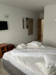 Postel nebo postele na pokoji v ubytování Casa Sunshine