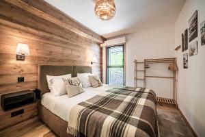 Ένα ή περισσότερα κρεβάτια σε δωμάτιο στο Apartment Cerna Les Houches - by EMERALD STAY +36 φωτογραφίες