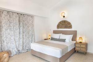 Voodi või voodid majutusasutuse Bergamot & Myrtillo Villas with shared pool,Afitos #FeelsLikeHome toas