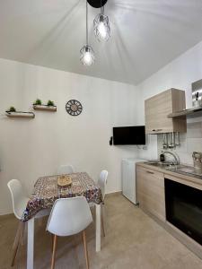 Η κουζίνα ή μικρή κουζίνα στο Casetta Bedda