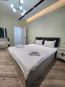 Katil atau katil-katil dalam bilik di ANDL APARTMENTS +3 gambar