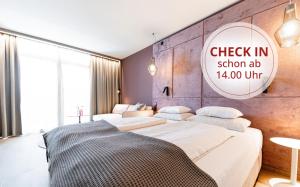 Postel nebo postele na pokoji v ubytování Avita Resort Bad Tatzmannsdorf
