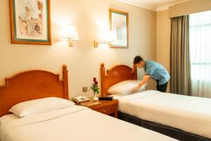 Postel nebo postele na pokoji v ubytování Sea View Hotel Dubai